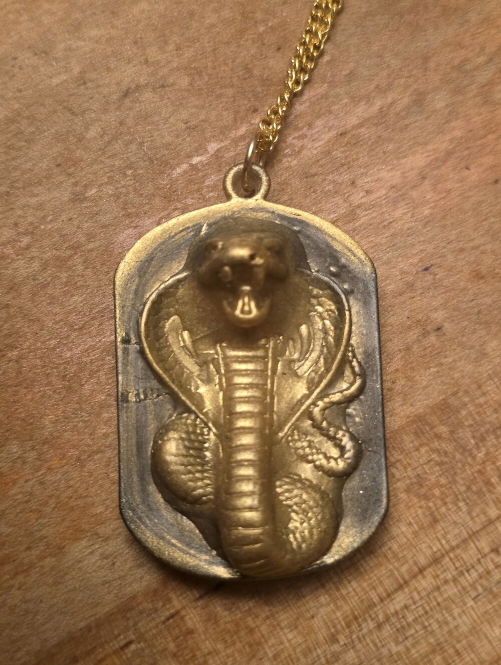 Gold & Black Resin Cobra Snake Pendant On A Gold Tone Chain Necklace